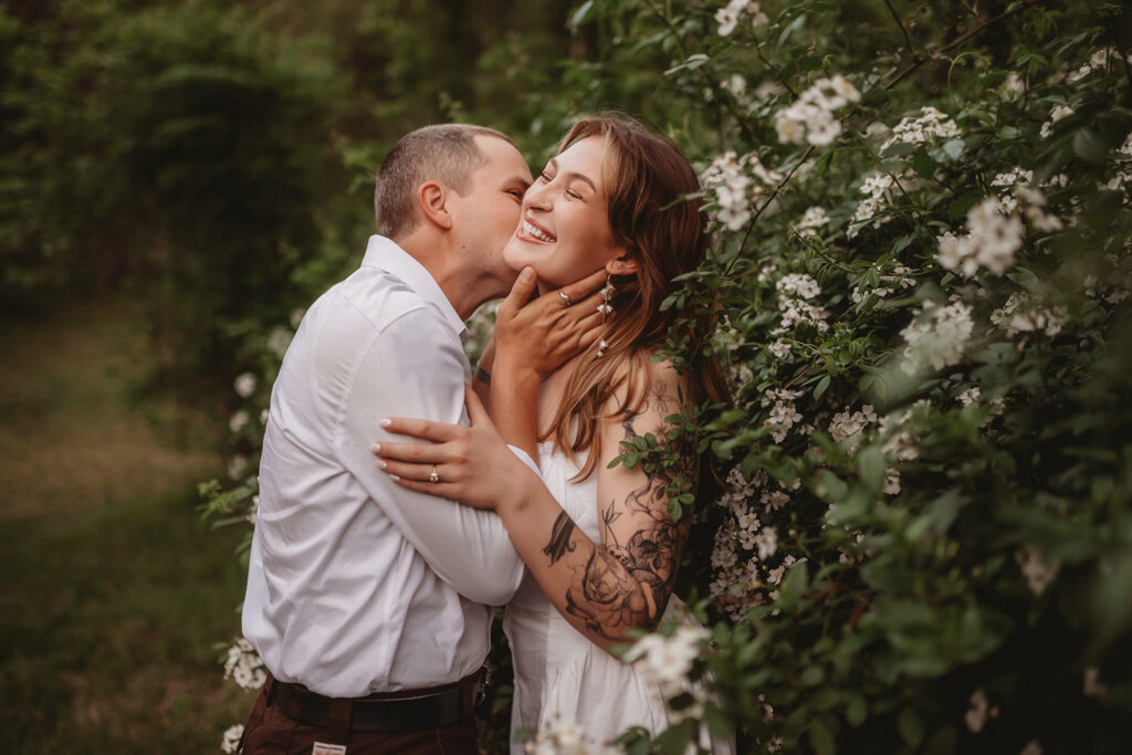 Newly Engaged Couple poses for Biltmore Estate Engagement Photos with Asheville Portrait Company in Asheville, NC