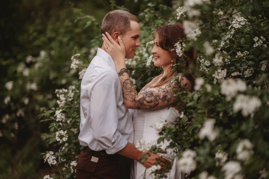 Newly Engaged Couple poses for Biltmore Estate Engagement Photos with Asheville Portrait Company in Asheville, NC