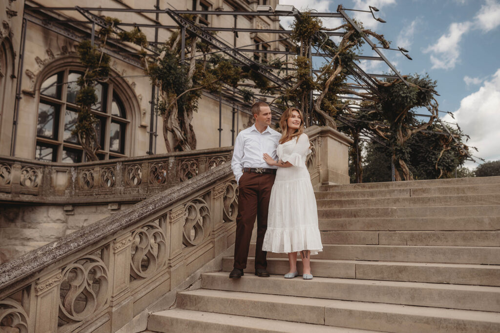 Newly Engaged Couple poses for Biltmore Estate Engagement Photos with Asheville Portrait Company in Asheville, NC